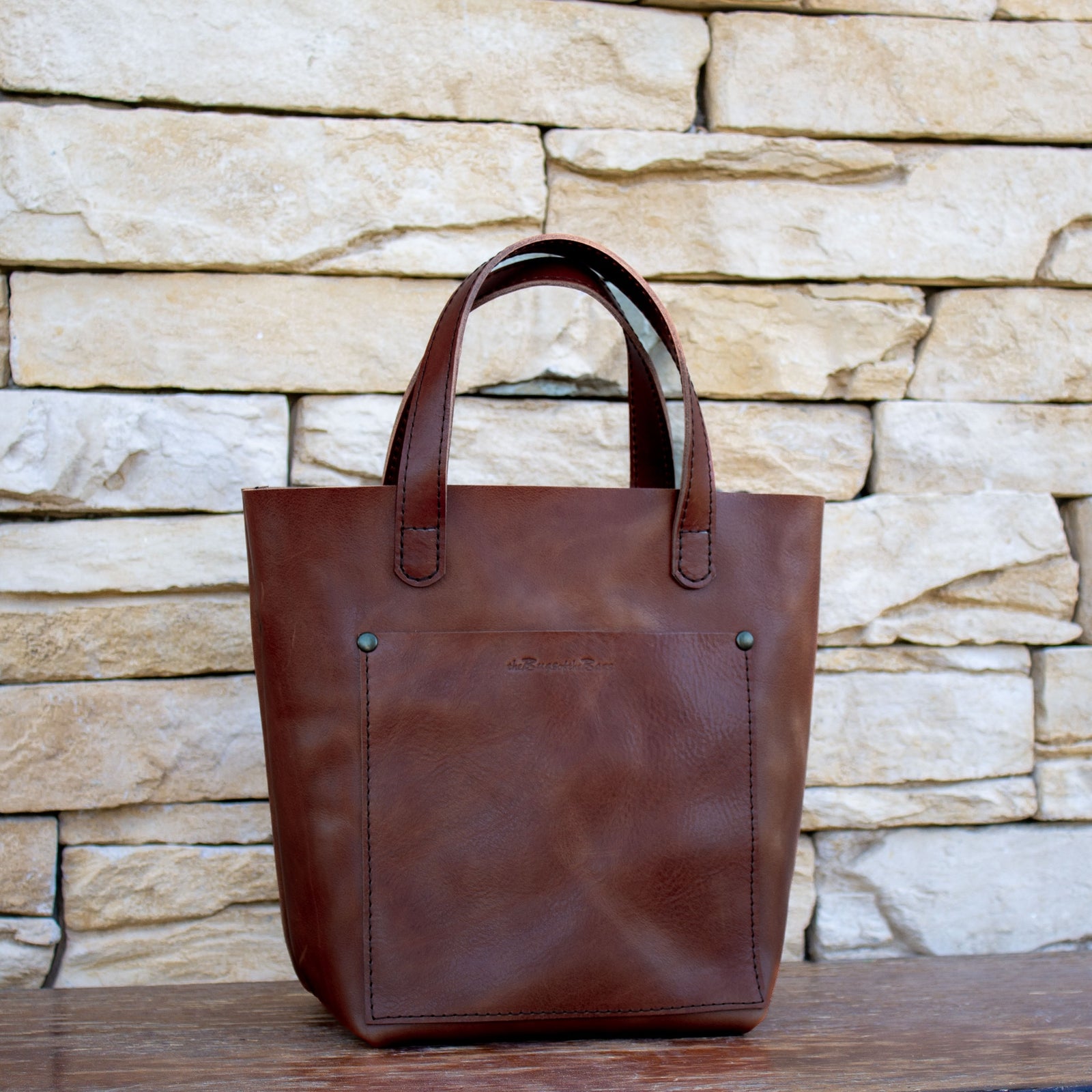 Handmade mini tote in Artigiano Italian leather, a perfect blend of luxury and practicality for your daily wardrobe.