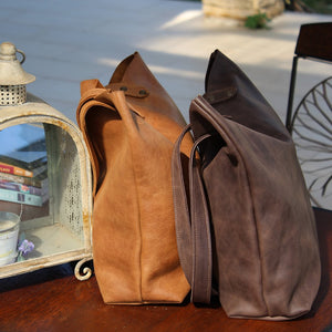 Two large tote bags in mattone and cognac, crafted to order from soft, premium Italian leather—a unique, handcrafted gift for any woman..